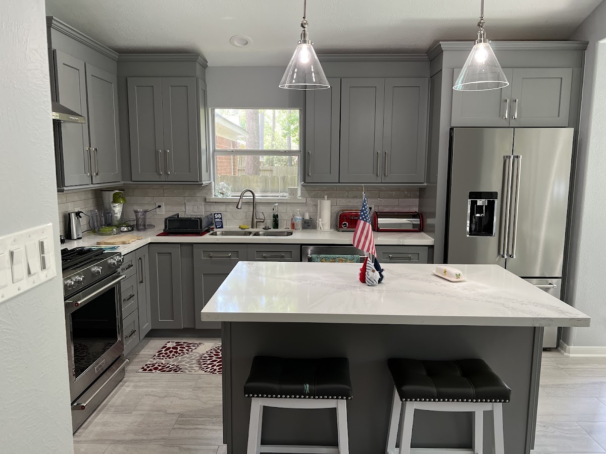 Modern gray cabinet kitchen with quartz countertops