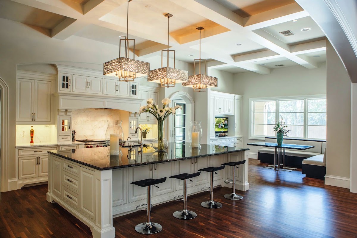 Luxury kitchen renovation with coffered ceiling and wooden beam accents