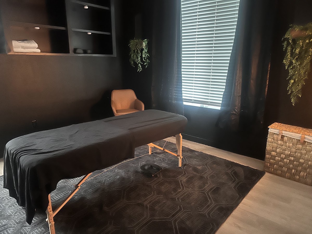 The private spa and massage room with dark luxurious decor
