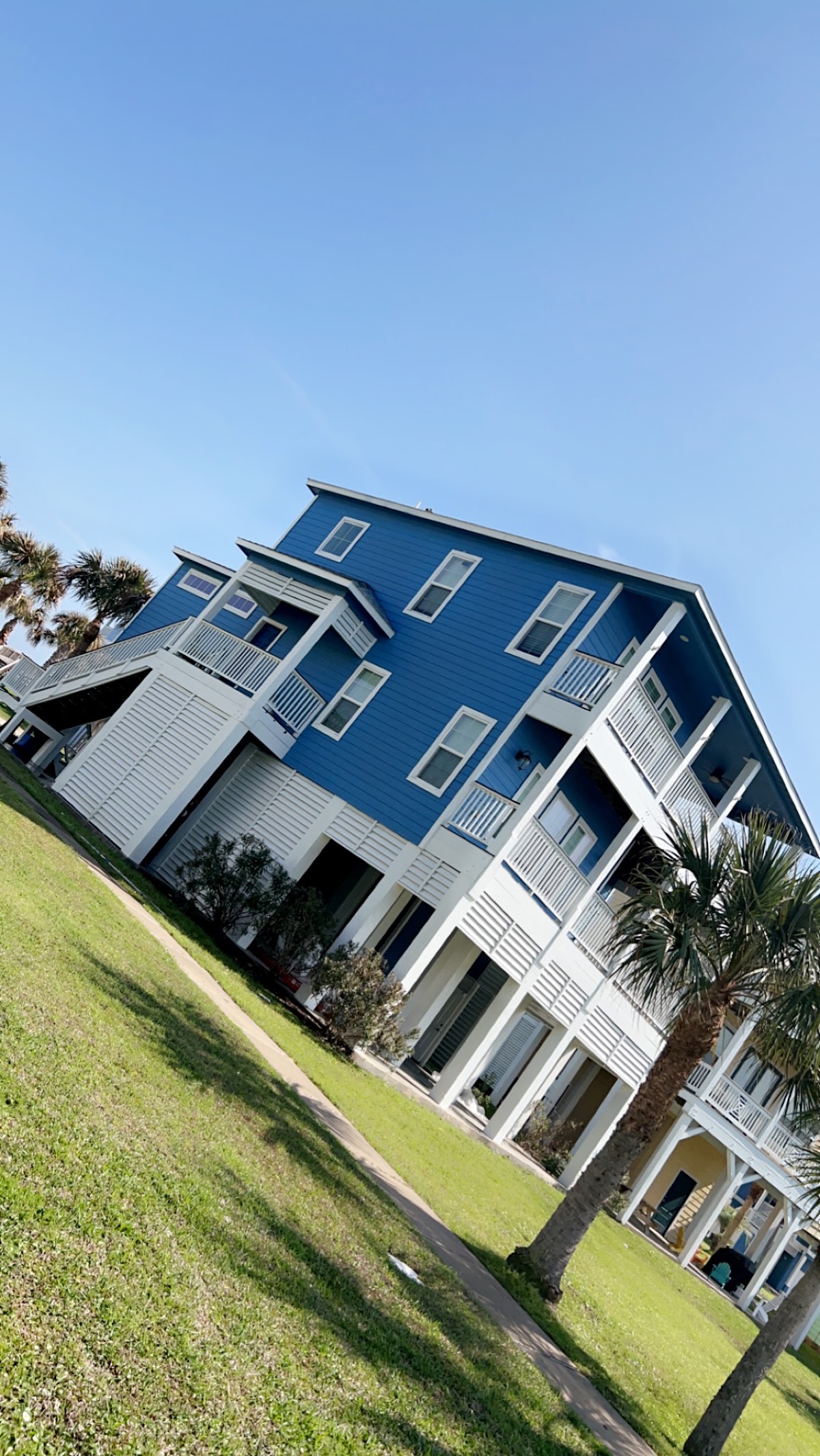Blue multi-story home exterior